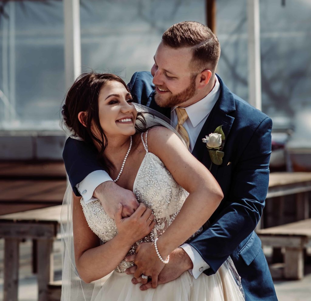 bride and groom embracing after wedding ceremony in Nashville