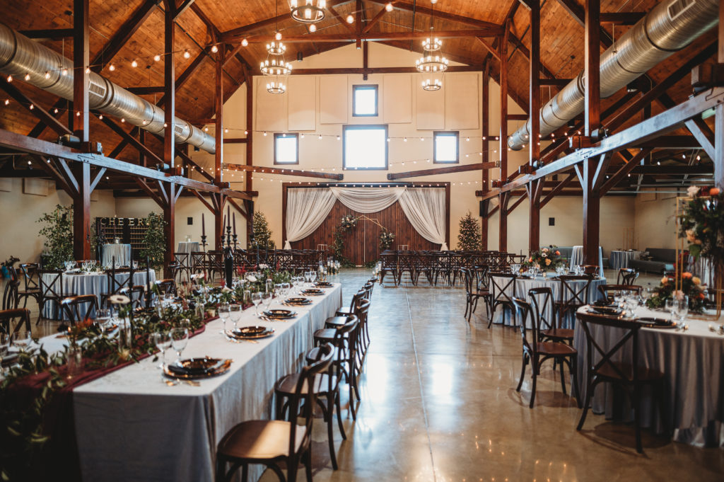 The Silo event center inside their barn indoor venue set up for after wedding dinner reception