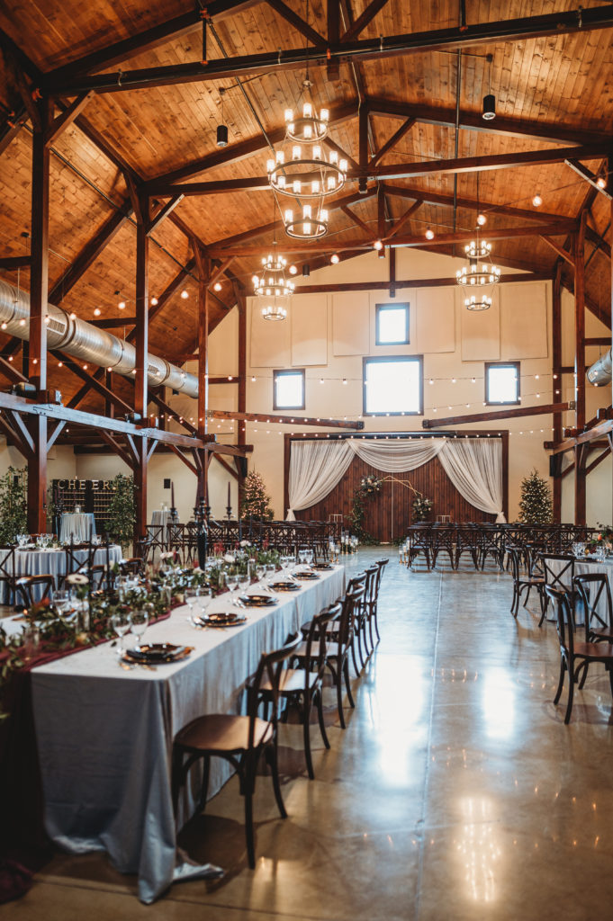 indoor wedding venue in beautiful barn with reception set up at the silo event center