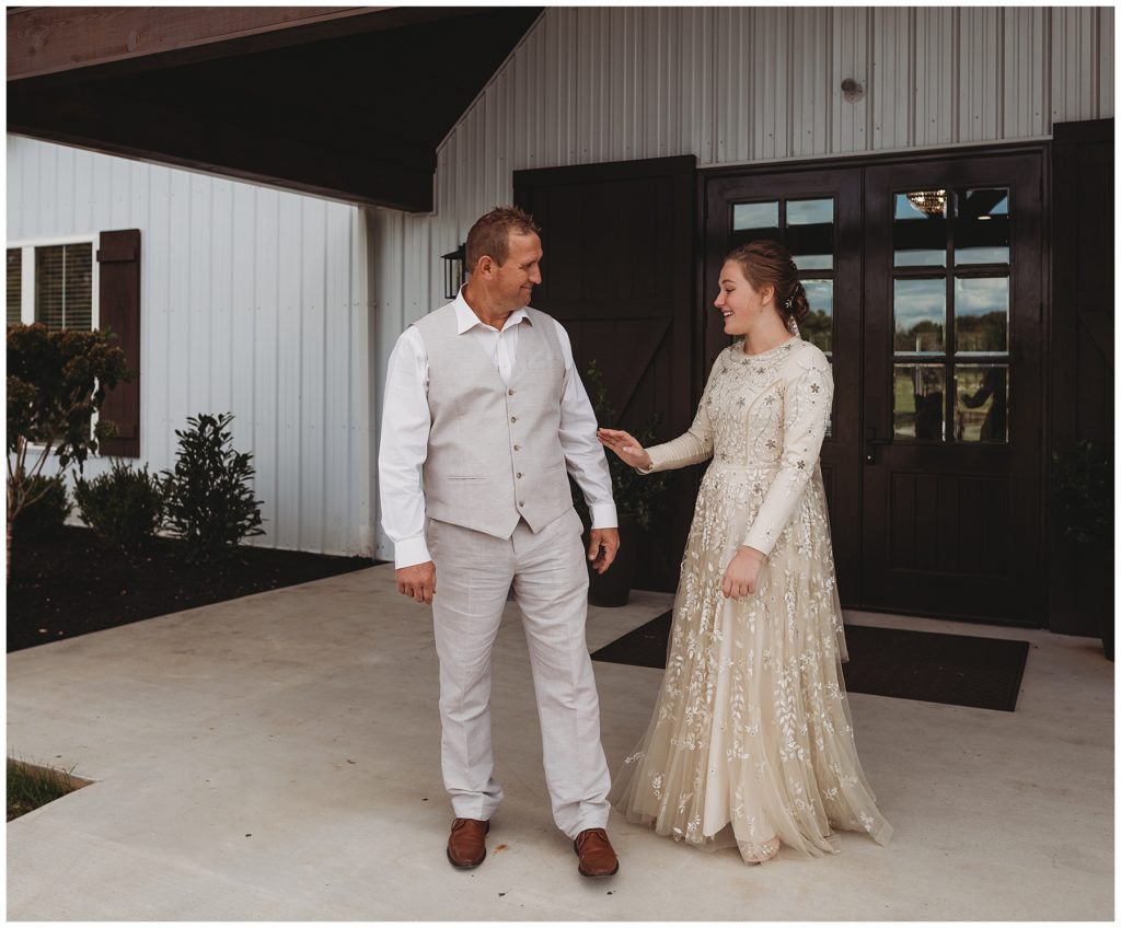 father seeing bride for first time on wedding day
