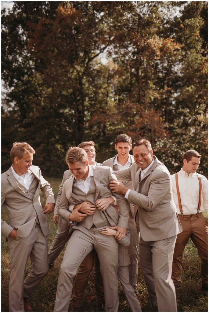 groomsmen messing with groom