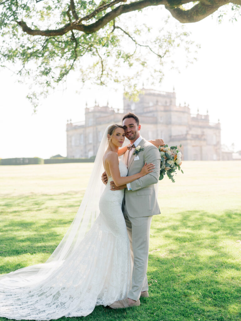 Bride and groom portrait in front of Kinmount House.